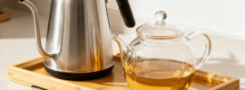 Elegant tea tray with multiple tea pots, perfect for assembling bundles from Zen Tea Tools selections.